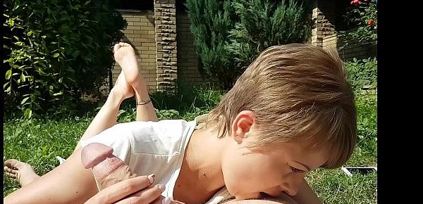  Pretty milf sucks him off with showing her little sexy soles in the yard